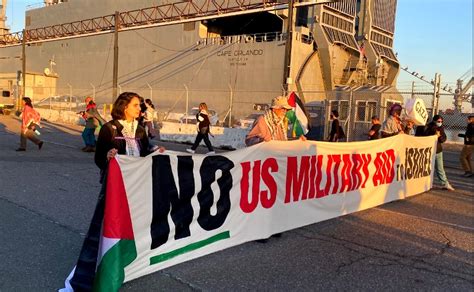 Gaza peace activists chain themselves to U.S. ship at Oakland port